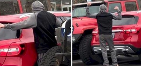 Ein Mann, der auf zwei Parkplätzen parkte, wurde von zwei Jeep Fahrern bestrafft